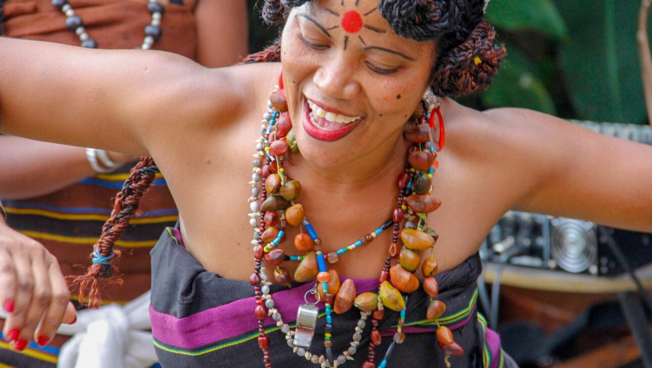 A woman in Madagascar dancing.